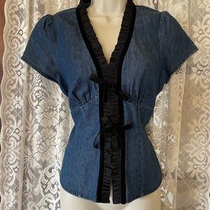 Navy denim top with black ruffle trim